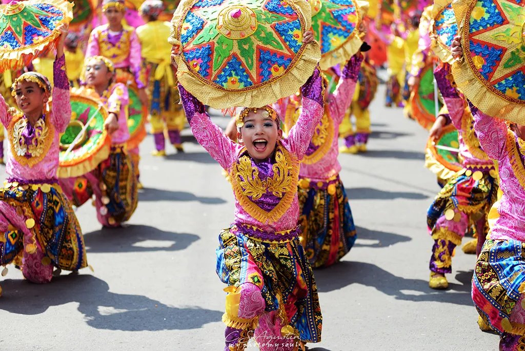 Dancing performers in the The Kadayawan Festival in Davao City. Their colorful costumes honor the original indigenous people and their unique traditions.