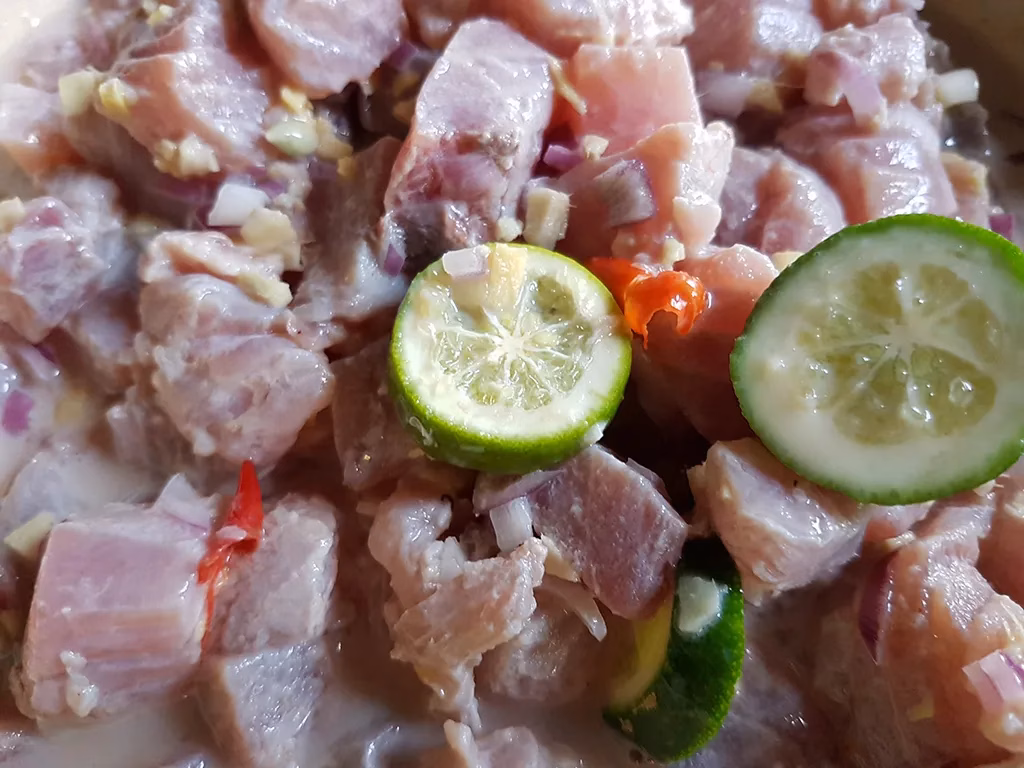 Kinilaw, a Filipino ceviche dish made with fresh fish marinated in vinegar and calamansi.