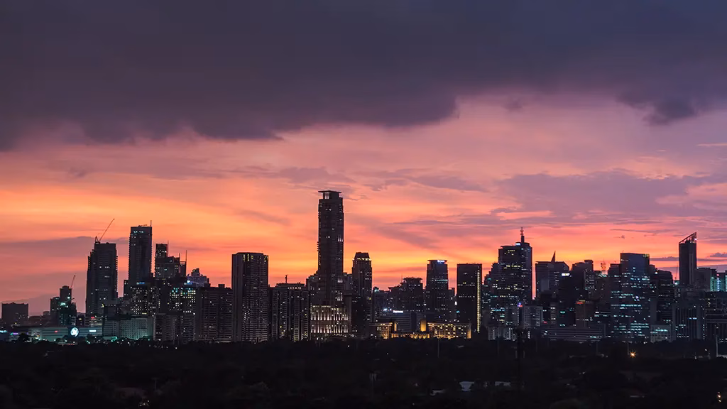 An amazing sunset view of the BGC skyline in Manila. If you take a trip to the Philippines, you will see gorgeous views like this!