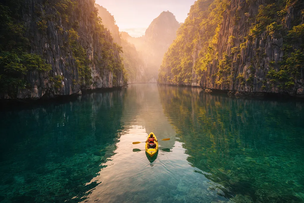 El Nido Small Lagoon kayaking limestone cliffs mirror reflection Palawan Philippines