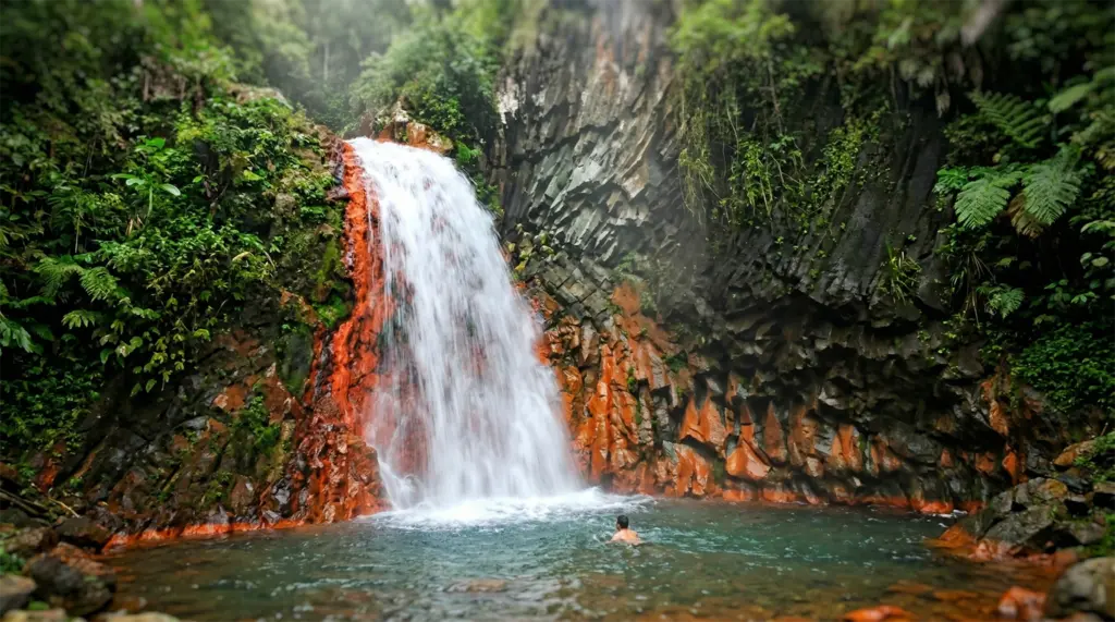 Pulangbato Falls red volcanic mineral rock Valencia Negros Oriental Philippines waterfall